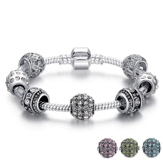 Crystal bead charm bracelet featuring sparkling beads and delicate charms, perfect for adding a touch of elegance and sparkle to any outfit. Ideal for both casual and formal occasions.