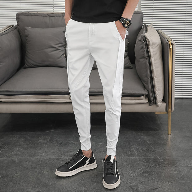 Men's casual harem pants, offering comfort and style for everyday wear. With a relaxed fit and tapered legs, these pants provide a modern twist on casual fashion.