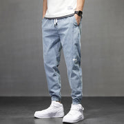 Denim hip hop sweatpants, blending style and comfort for urban fashion. Featuring a denim fabric and relaxed fit, these sweatpants offer a trendy look with a touch of streetwear flair.