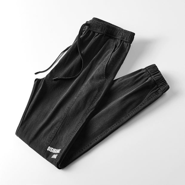 Denim hip hop sweatpants, blending style and comfort for urban fashion. Featuring a denim fabric and relaxed fit, these sweatpants offer a trendy look with a touch of streetwear flair.