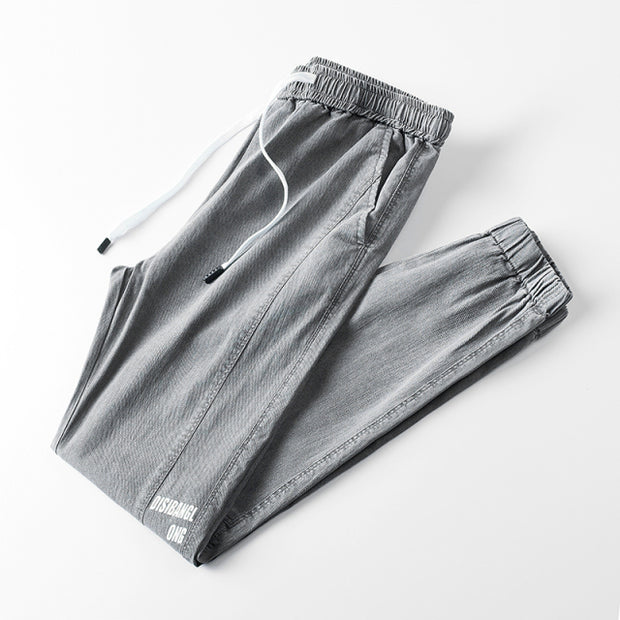 Denim hip hop sweatpants, blending style and comfort for urban fashion. Featuring a denim fabric and relaxed fit, these sweatpants offer a trendy look with a touch of streetwear flair.