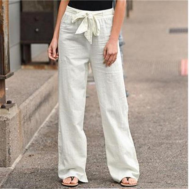 Women's high waist straight trousers, tailored for a sleek, sophisticated look. Versatile and flattering, ideal for both casual and formal occasions.