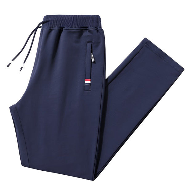 Loose fit men's stretch pants, offering comfort and flexibility for everyday wear. Featuring a relaxed fit and stretchable fabric, these pants are perfect for casual outings and active lifestyles.