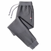 Loose fit men's stretch pants, offering comfort and flexibility for everyday wear. Featuring a relaxed fit and stretchable fabric, these pants are perfect for casual outings and active lifestyles.